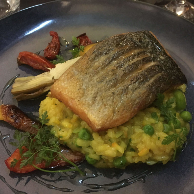 Fish on a bed of risotto