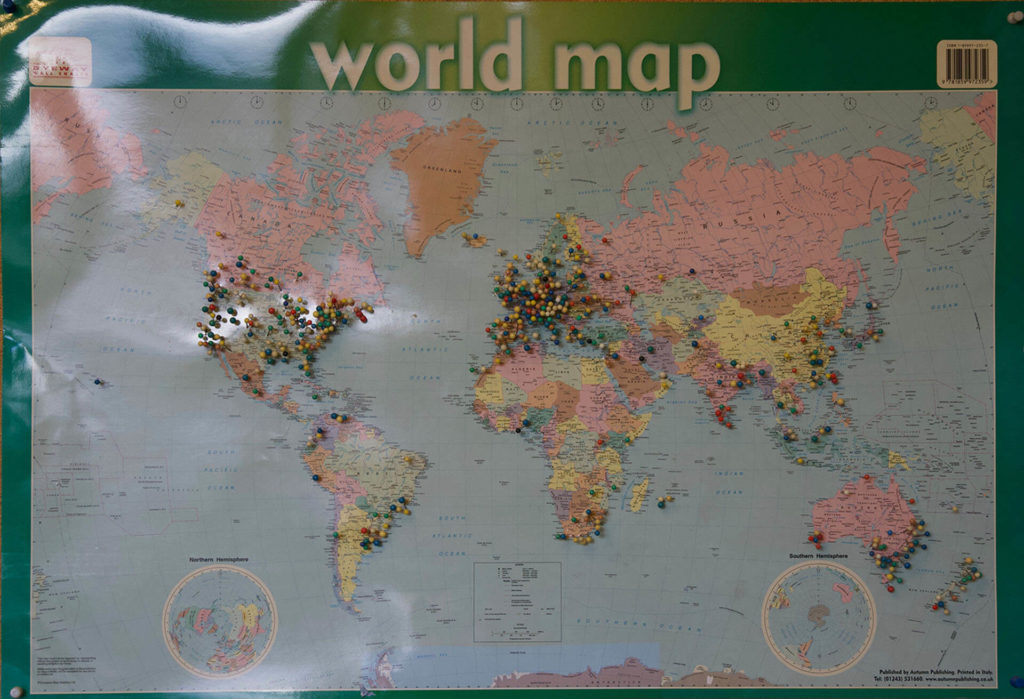 World map with pins showing where guests have come from