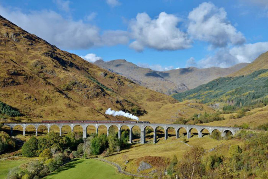 The Glenfinnan Viaduct with a steam train going over