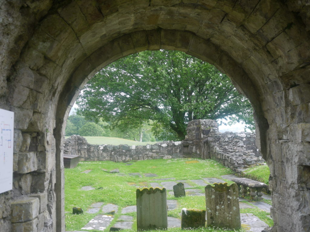 Through an archway to the countryside at Ardchattan Priory
